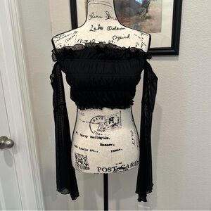 Cosmic Aura Off-Shoulder Black Ruffled Crop Top